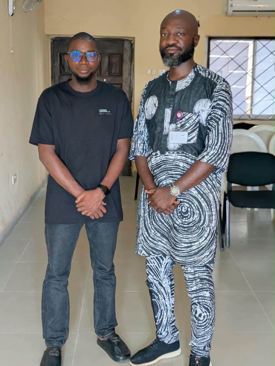 Rasheed with a colleague at the goodbye