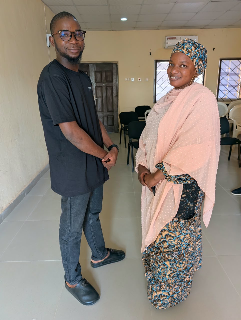 Rasheed with a colleague at the goodbye