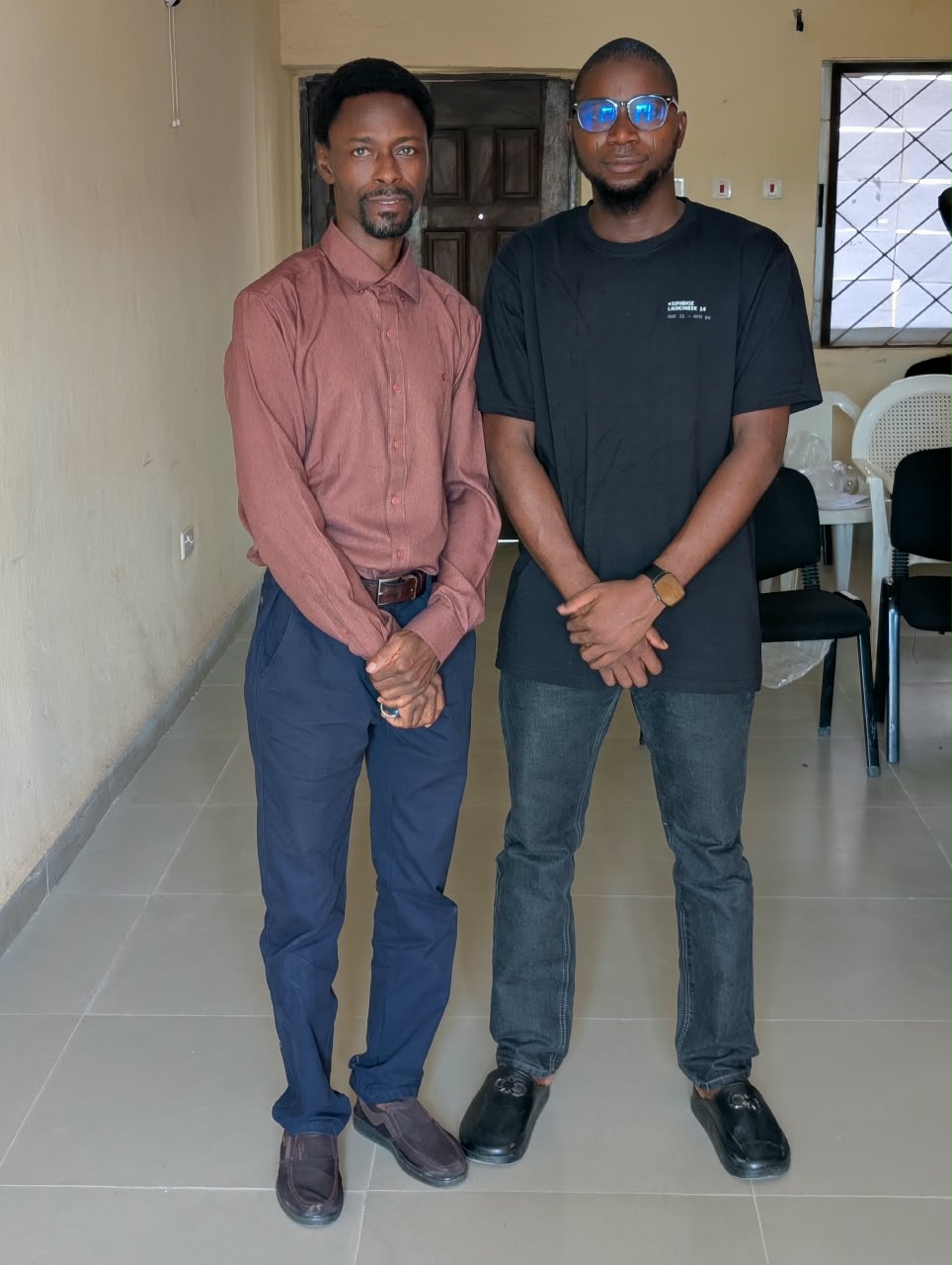 Rasheed with a colleague at the goodbye