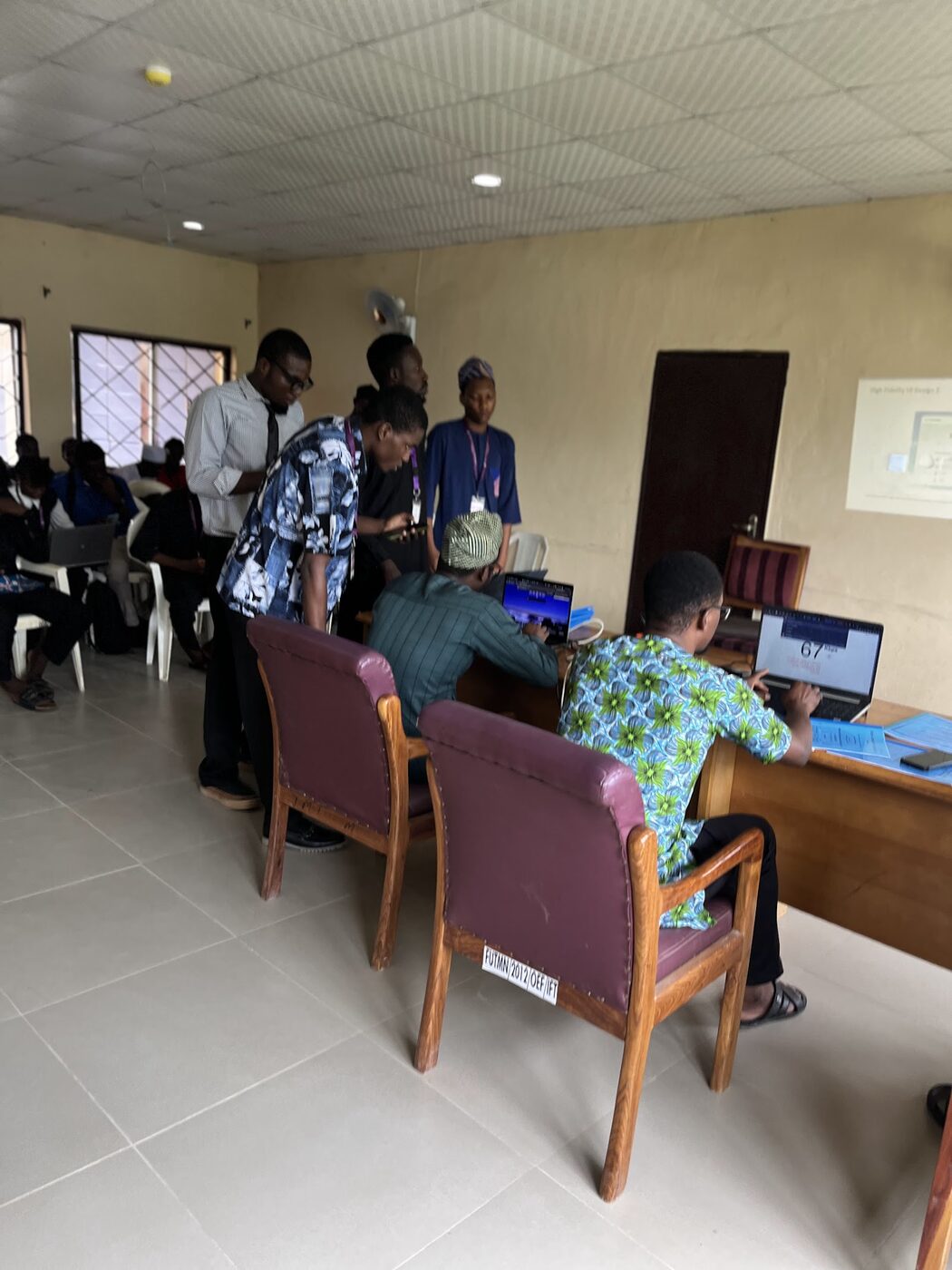 The presentation room with the lecturer panel and students